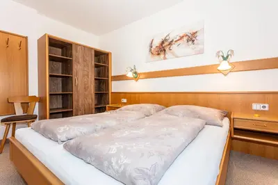 Ein Bett oder Betten in einem Zimmer der Unterkunft Apartment Hintermaisalm