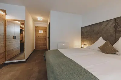 Ein Bett oder Betten in einem Zimmer der Unterkunft Der Gollinger