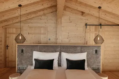 Ein Bett oder Betten in einem Zimmer der Unterkunft Hygna Chalets