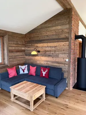 Ein Sitzbereich in der Unterkunft Ferienwohnung Remise am Reitl