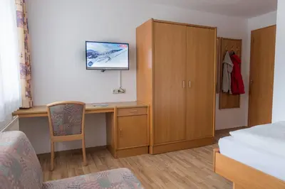 Ein Bett oder Betten in einem Zimmer der Unterkunft Die Pension - Margreiter