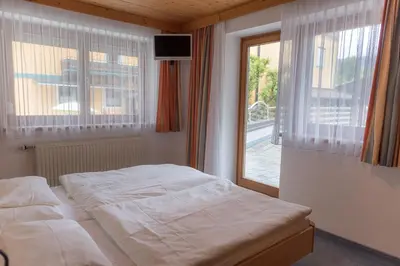 Ein Bett oder Betten in einem Zimmer der Unterkunft Die Pension - Margreiter