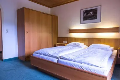 Ein Bett oder Betten in einem Zimmer der Unterkunft Die Pension - Margreiter