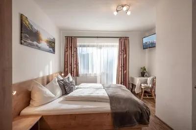 Ein Bett oder Betten in einem Zimmer der Unterkunft Haus Barbara