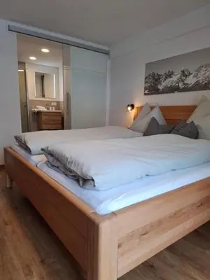 Ein Bett oder Betten in einem Zimmer der Unterkunft Haus Kaufmann