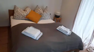 Ein Bett oder Betten in einem Zimmer der Unterkunft Appartment Römerstrasse