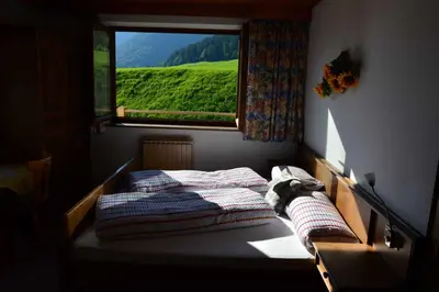 Ein Bett oder Betten in einem Zimmer der Unterkunft Weindlhof