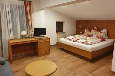 Ein Bett oder Betten in einem Zimmer der Unterkunft Hinterreithlehen - Ferienwohnung am Bauernhof