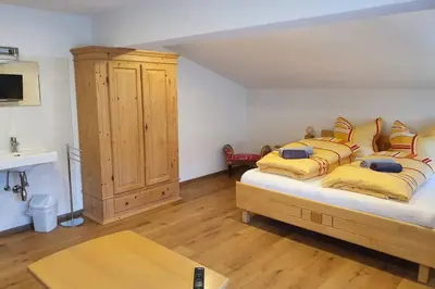 Ein Bett oder Betten in einem Zimmer der Unterkunft Hinterreithlehen - Ferienwohnung am Bauernhof