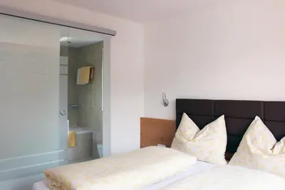 Ein Bett oder Betten in einem Zimmer der Unterkunft Appartements Haus Ruetz