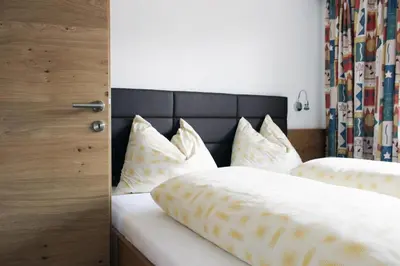 Ein Bett oder Betten in einem Zimmer der Unterkunft Appartements Haus Ruetz