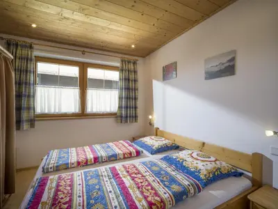 Ein Bett oder Betten in einem Zimmer der Unterkunft Apartment Erich Brixen