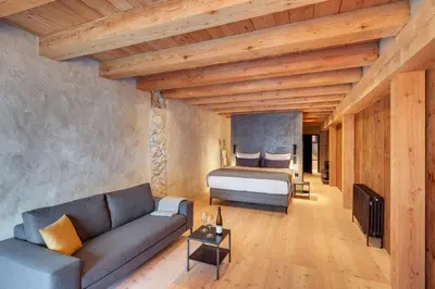 Ein Bett oder Betten in einem Zimmer der Unterkunft Boutiquehotel Rattenberg