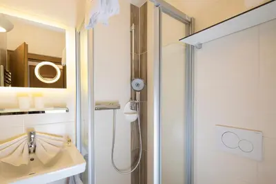 Ein Badezimmer in der Unterkunft Angerer Alpine Suiten und Familienappartements Tirol