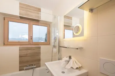 Ein Badezimmer in der Unterkunft Angerer Alpine Suiten und Familienappartements Tirol