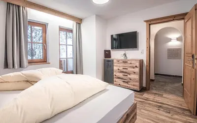 Ein Bett oder Betten in einem Zimmer der Unterkunft La Tombola Appartements