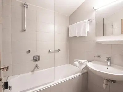 Ein Badezimmer in der Unterkunft La Tombola Appartements
