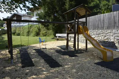 Ein Kinderspielbereich in der Unterkunft Resort Tirol am Wildenbach