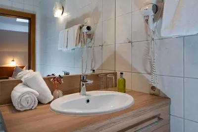 Ein Badezimmer in der Unterkunft dasKAISER - Dein Gartenhotel in Tirol