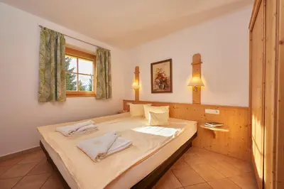 Ein Bett oder Betten in einem Zimmer der Unterkunft Appartement Hotel Sonneck