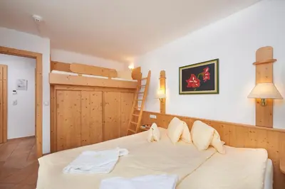 Ein Bett oder Betten in einem Zimmer der Unterkunft Appartement Hotel Sonneck