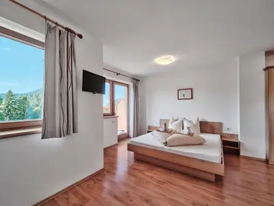 Ein Bett oder Betten in einem Zimmer der Unterkunft Berggasthof Bärnstatt