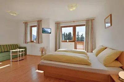 Ein Bett oder Betten in einem Zimmer der Unterkunft Berggasthof Bärnstatt