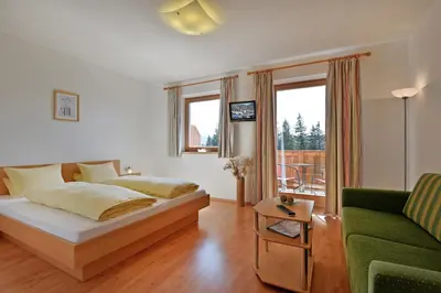 Ein Bett oder Betten in einem Zimmer der Unterkunft Berggasthof Bärnstatt