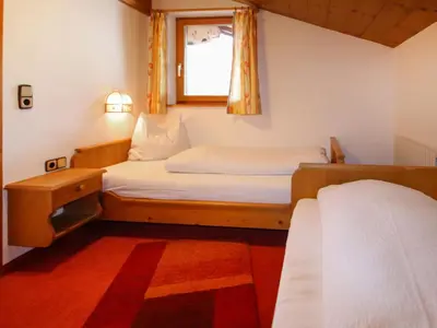 Ein Bett oder Betten in einem Zimmer der Unterkunft Apartment Elisabeth by Interhome