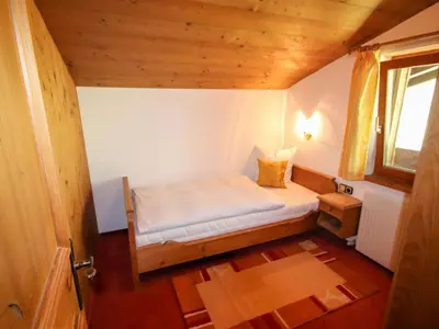 Ein Bett oder Betten in einem Zimmer der Unterkunft Apartment Elisabeth by Interhome