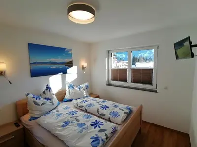 Ein Bett oder Betten in einem Zimmer der Unterkunft Bergluft