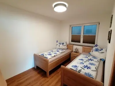 Ein Bett oder Betten in einem Zimmer der Unterkunft Bergluft