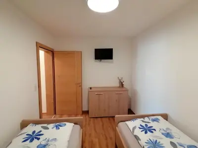 Ein Bett oder Betten in einem Zimmer der Unterkunft Bergluft