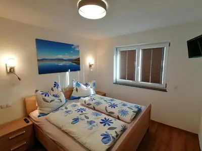 Ein Bett oder Betten in einem Zimmer der Unterkunft Bergluft