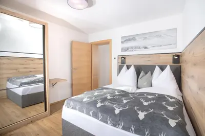 Ein Bett oder Betten in einem Zimmer der Unterkunft Apart Dahoam