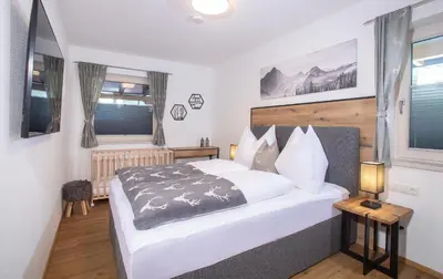 Ein Bett oder Betten in einem Zimmer der Unterkunft Apart Dahoam