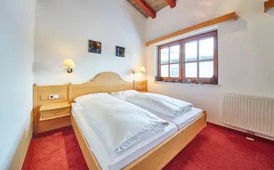 Ein Bett oder Betten in einem Zimmer der Unterkunft MidTown Appartements