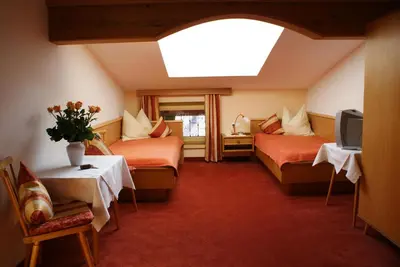 Ein Bett oder Betten in einem Zimmer der Unterkunft Gasthof Riederhof