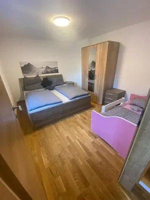 Ein Bett oder Betten in einem Zimmer der Unterkunft Ferienhaus Esila