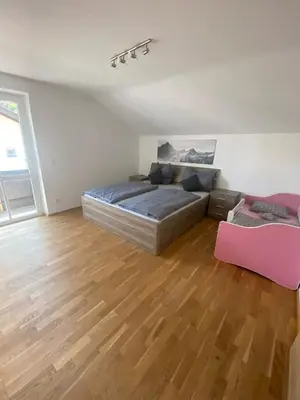 Ein Bett oder Betten in einem Zimmer der Unterkunft Ferienhaus Esila