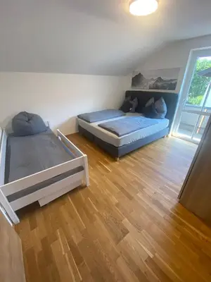Ein Bett oder Betten in einem Zimmer der Unterkunft Ferienhaus Esila