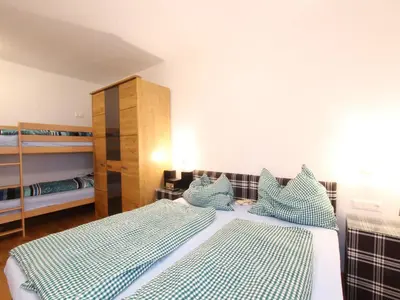 Ein Bett oder Betten in einem Zimmer der Unterkunft Apartment in Neukirchen near Ski Lift