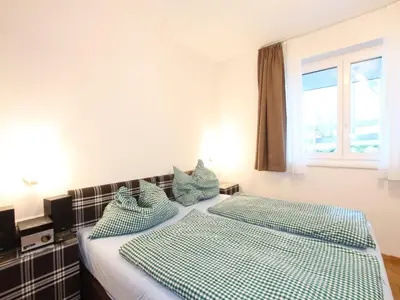 Ein Bett oder Betten in einem Zimmer der Unterkunft Apartment in Neukirchen near Ski Lift