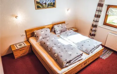 Ein Bett oder Betten in einem Zimmer der Unterkunft Schoenes Ferienhaus Zillertal