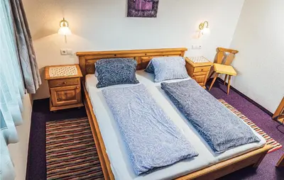 Ein Bett oder Betten in einem Zimmer der Unterkunft Schoenes Ferienhaus Zillertal
