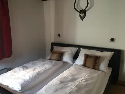 Ein Bett oder Betten in einem Zimmer der Unterkunft Toni Sailer Haus apartment