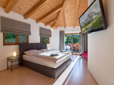 Ein Bett oder Betten in einem Zimmer der Unterkunft Ferienwohnung Pacher