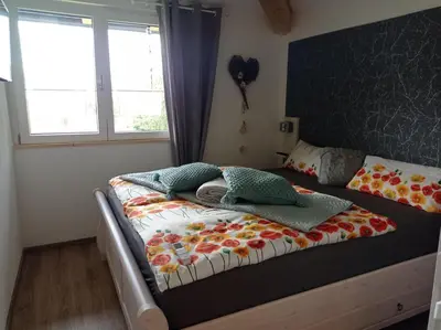 Ein Bett oder Betten in einem Zimmer der Unterkunft Haus Siebenschläfer