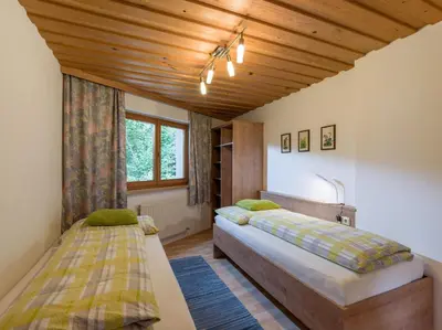 Ein Bett oder Betten in einem Zimmer der Unterkunft Haus am Waldesrand