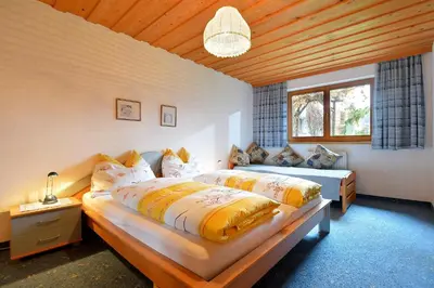Ein Bett oder Betten in einem Zimmer der Unterkunft Haus am Waldesrand